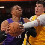 Sacramento Kings guard Russell Westbrook (18) is fouled by Los Angeles Lakers forward Jake LaRavia (12) in the fourth quarter at the Golden 1 Center.