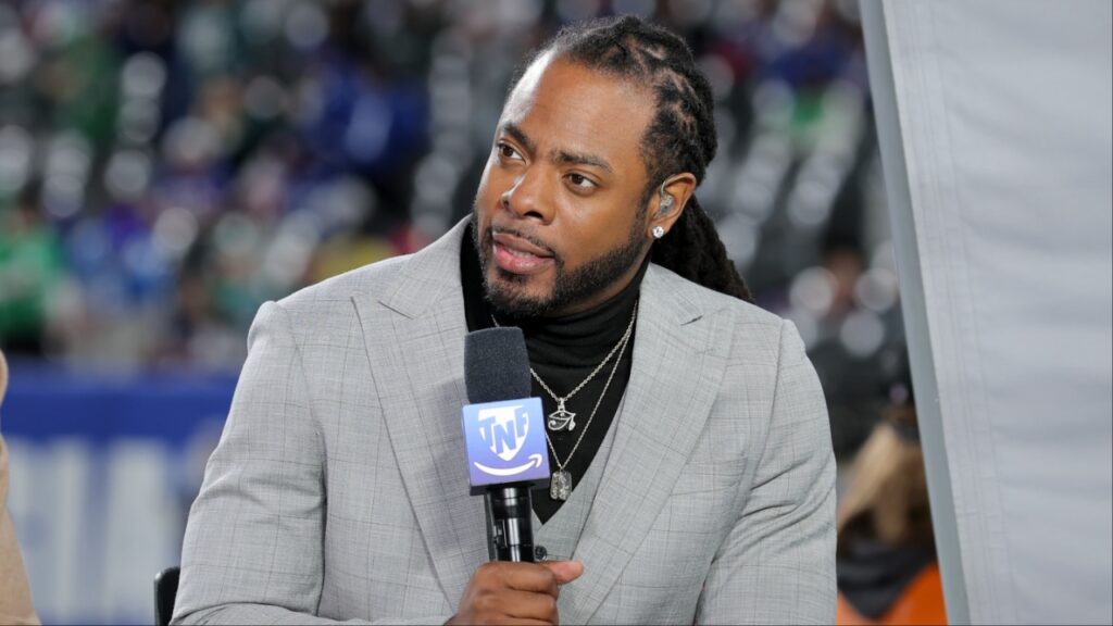 Richard Sherman is seen on the Thursday Night Football set before the game between the New York Giants and the Philadelphia Eagles at MetLife Stadium.