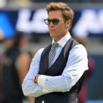 Tom Brady looks on before the game between the Los Angeles Chargers and the Washington Commanders at SoFi Stadium.