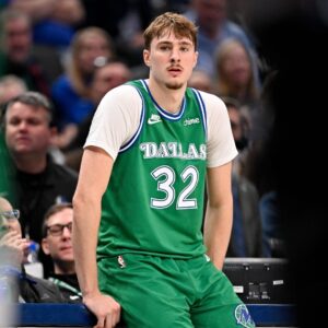 Jan 12, 2026; Dallas, Texas, USA; Dallas Mavericks forward Cooper Flagg (32) looks on during the second half against the Brooklyn Nets at the American Airlines Center