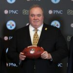 Daniel Martin Rooney (left), Pittsburgh Steelers owner Art Rooney II (left center) and general manager Omar Khan (right) flank Mike McCarthy (middle) at a press conference announcing McCarthy as the new Pittsburgh Steelers head coach at PNC Champions Club at Acrisure Stadium.