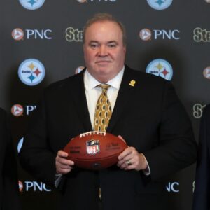 Daniel Martin Rooney (left), Pittsburgh Steelers owner Art Rooney II (left center) and general manager Omar Khan (right) flank Mike McCarthy (middle) at a press conference announcing McCarthy as the new Pittsburgh Steelers head coach at PNC Champions Club at Acrisure Stadium.