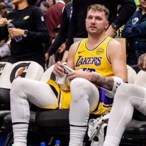Los Angeles Lakers forward/guard Luka Doncic (77) sits on a the bench against the New Orleans Pelicans during the second half at Smoothie King Center