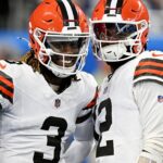 Cleveland Browns wide receiver Jerry Jeudy (3) and Cleveland Browns quarterback Shedeur Sanders (12) warm up before the game against the Detroit Lions at Ford Field.