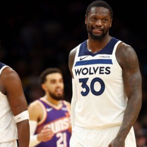 Jan 29, 2025; Phoenix, Arizona, USA; Minnesota Timberwolves guard Anthony Edwards (5) with forward Julius Randle (30) against the Phoenix Suns at Footprint Center.