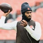 Cleveland Browns quarterback Shedeur Sanders (12) warms up before the game against the Tennessee Titans at Huntington Bank Field.