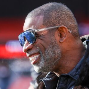 Legendary football and baseball player and father of Cleveland Browns quarterback Shedeur Sanders, Deion Sanders on the sidelines prior to a game against the Buffalo Bills at Huntington Bank Field.
