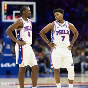 Philadelphia 76ers guard Tyrese Maxey (0) talks with guard Kyle Lowry (7) during the third quarter against the Memphis Grizzlies at Wells Fargo Center.