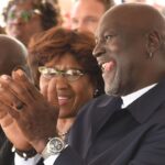 Michael Jordan listens to the speakers outside of The Michael Jordan Family Medical Clinic led by Novant Health before taking part in a ribbon cutting ceremony for the new clinic opening off of Greenfield Street on Tuesday May 7, 2024, in Wilmington, N.C.