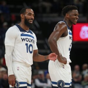 Minnesota Timberwolves guard Mike Conley (10) and guard Anthony Edwards (5) react during the third quarter against the Memphis Grizzlies at FedExForum.