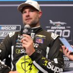 Feb 11, 2026; Daytona Beach, Florida, USA; NASCAR Cup Series driver Shane Van Gisbergen (97) speaks to the media during the Daytona 500 Media Day at Daytona International Speedway.