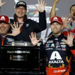 Feb 16, 2025; Daytona Beach, Florida, USA; NASCAR Cup Series driver William Byron (24) poses with the Harley J. Earl trophy after winning the Daytona 500 at Daytona International Speedway.