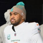 Miami Dolphins quarterback Tua Tagovailoa (1) walks out of the player tunnel before the game against the New England Patriots at Gillette Stadium.