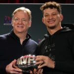 Roger Goodell handing Patrick Mahomes the NFL Super Bowl MVP award