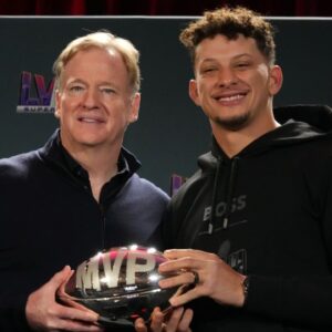 Roger Goodell handing Patrick Mahomes the NFL Super Bowl MVP award