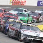 Oct 26, 2025; Martinsville, Virginia, USA; NASCAR Cup Series driver Ryan Blaney (12) leads during stage three of the Xfinity 500 at Martinsville Speedway