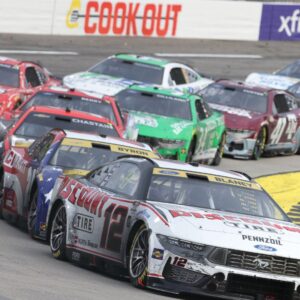Oct 26, 2025; Martinsville, Virginia, USA; NASCAR Cup Series driver Ryan Blaney (12) leads during stage three of the Xfinity 500 at Martinsville Speedway