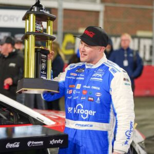 Feb 4, 2026; WInston-Salem, North Carolina, USA; NASCAR Cup Series driver Ryan Preece (60) holds the Bobby Allison Memorial Trophy after winning the Cook Out Clash at Bowman Gray Stadium