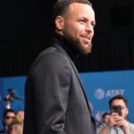 Feb 15, 2026; Los Angeles, CA, USA; Team USA Stripes guard Stephen Curry (30) of the Golden State Warriors on the red carpet before the 75th NBA All Star Game at Intuit Dome
