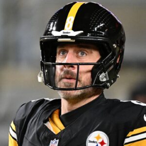 Pittsburgh Steelers quarterback Aaron Rodgers (8) warms up before an AFC Wild Card Round game against the Houston Texans at Acrisure Stadium.