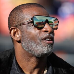 Legendary football and baseball player and father of Cleveland Browns quarterback Shedeur Sanders, Deion Sanders on the sidelines prior to a game against the Buffalo Bills at Huntington Bank Field.
