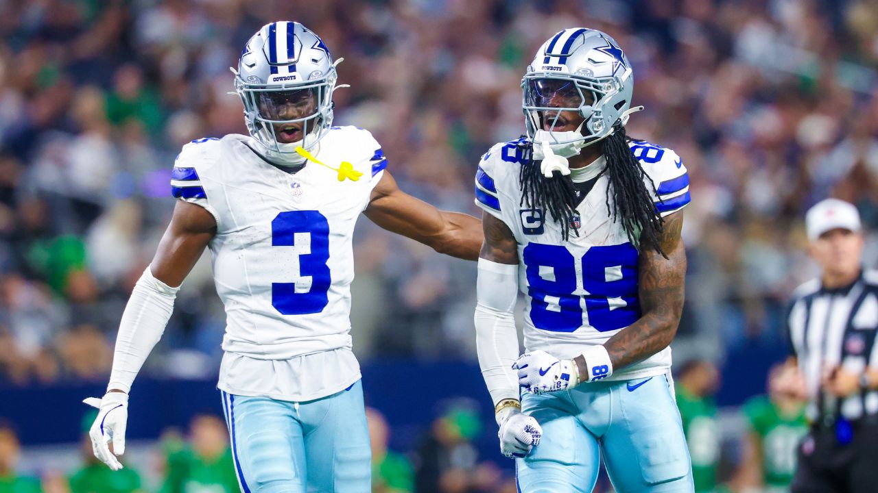 Dallas Cowboys wide receiver George Pickens (3) and Dallas Cowboys wide receiver CeeDee Lamb (88) react during the game against the Philadelphia Eagles at AT&T Stadium.