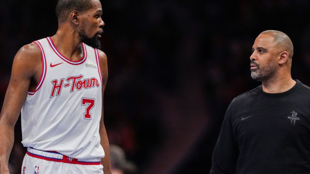 Feb 19, 2026; Charlotte, North Carolina, USA; Houston Rockets forward Kevin Durant (7) talks with head coach Ime Udoka during the second quarter against the Charlotte Hornets at Spectrum Center