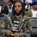 Los Angeles Clippers Darius Garland watches the game against the Cleveland Cavaliers in the second half at Intuit Dome.
