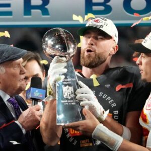 Super Bowl 57: Kansas City Chiefs quarterback Patrick Mahomes passes the the Lombardi Trophy to Travis Kelce after winning the Super Bowl against the Philadelphia Eagles at State Farm Stadium on Feb 12, 2023.