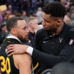 Milwaukee Bucks forward Giannis Antetokounmpo (34) and Golden State Warriors guard Stephen Curry (30) meet after the game at the Chase Center.