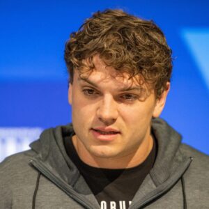 Washington tight end Jack Westover (TE15) talks to the media during the 2024 NFL Combine at Lucas Oil Stadium.