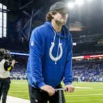 Indianapolis Colts quarterback Daniel Jones moves along the sideline on a scooter Sunday, Dec. 28, 2025, ahead a game against the Jacksonville Jaguars at Lucas Oil Stadium in Indianapolis.