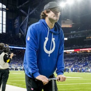 Indianapolis Colts quarterback Daniel Jones moves along the sideline on a scooter Sunday, Dec. 28, 2025, ahead a game against the Jacksonville Jaguars at Lucas Oil Stadium in Indianapolis.
