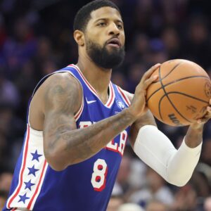 Jan 27, 2026; Philadelphia, Pennsylvania, USA; Philadelphia 76ers forward Paul George (8) shoots the ball against the Milwaukee Bucks during the third quarter at Xfinity Mobile Arena