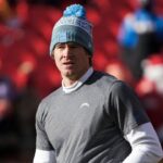 Los Angeles Chargers quarterback Justin Herbert (10) participates in early pregame warmups against the Kansas City Chiefs at GEHA Field at Arrowhead Stadium.