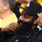 Arizona State Sun Devils former player James Harden sits courtside during the game against the Arizona Wildcats in the second half at Desert Financial Arena
