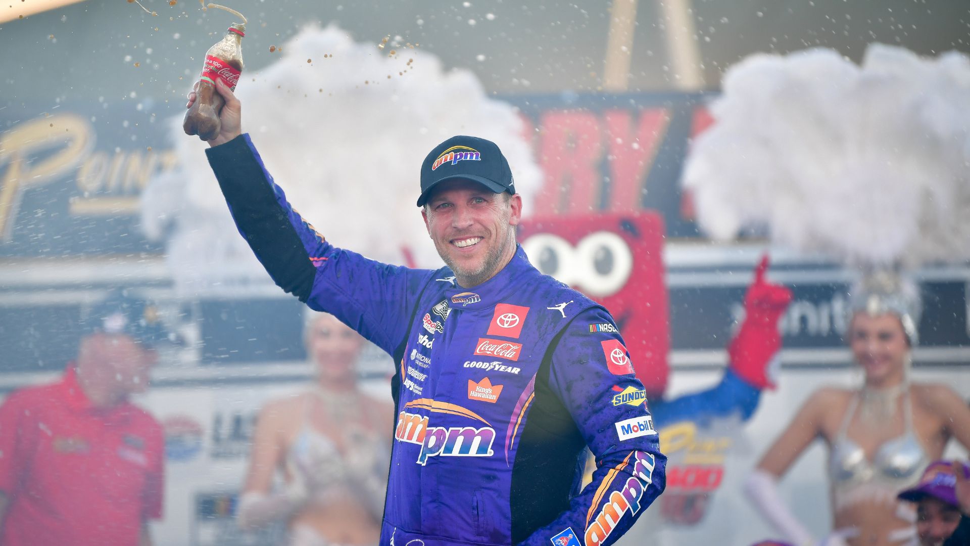 Oct 12, 2025; Las Vegas, Nevada, USA; NASCAR Cup Series driver Denny Hamlin (11) celebrates his victory following the South Point 400 at Las Vegas Motor Speedway