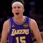 Feb 5, 2026; Los Angeles, California, USA; Los Angeles Lakers guard Austin Reaves (15) reacts at the buzzer defeating the Philadelphia 76ers at Crypto.com Arena.