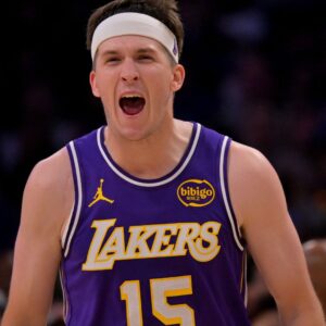 Feb 5, 2026; Los Angeles, California, USA; Los Angeles Lakers guard Austin Reaves (15) reacts at the buzzer defeating the Philadelphia 76ers at Crypto.com Arena.