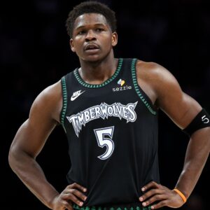 Feb 22, 2026; Minneapolis, Minnesota, USA; Minnesota Timberwolves guard Anthony Edwards (5) looks on during the first half against the Philadelphia 76ers at Target Center.