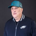 Philadelphia Eagles defensive coordinator Vic Fangio walks onto the field before the game against the Las Vegas Raiders at Lincoln Financial Field.