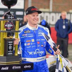 Feb 4, 2026; WInston-Salem, North Carolina, USA; NASCAR Cup Series driver Ryan Preece (60) holds the Bobby Allison Memorial Trophy after winning the Cook Out Clash at Bowman Gray Stadium.