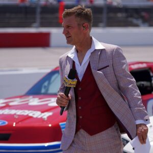 Fox Sports analyst and former NASCAR driver Clint Bowyer on pit road prior to the Goodyear 400 at Darlington Raceway