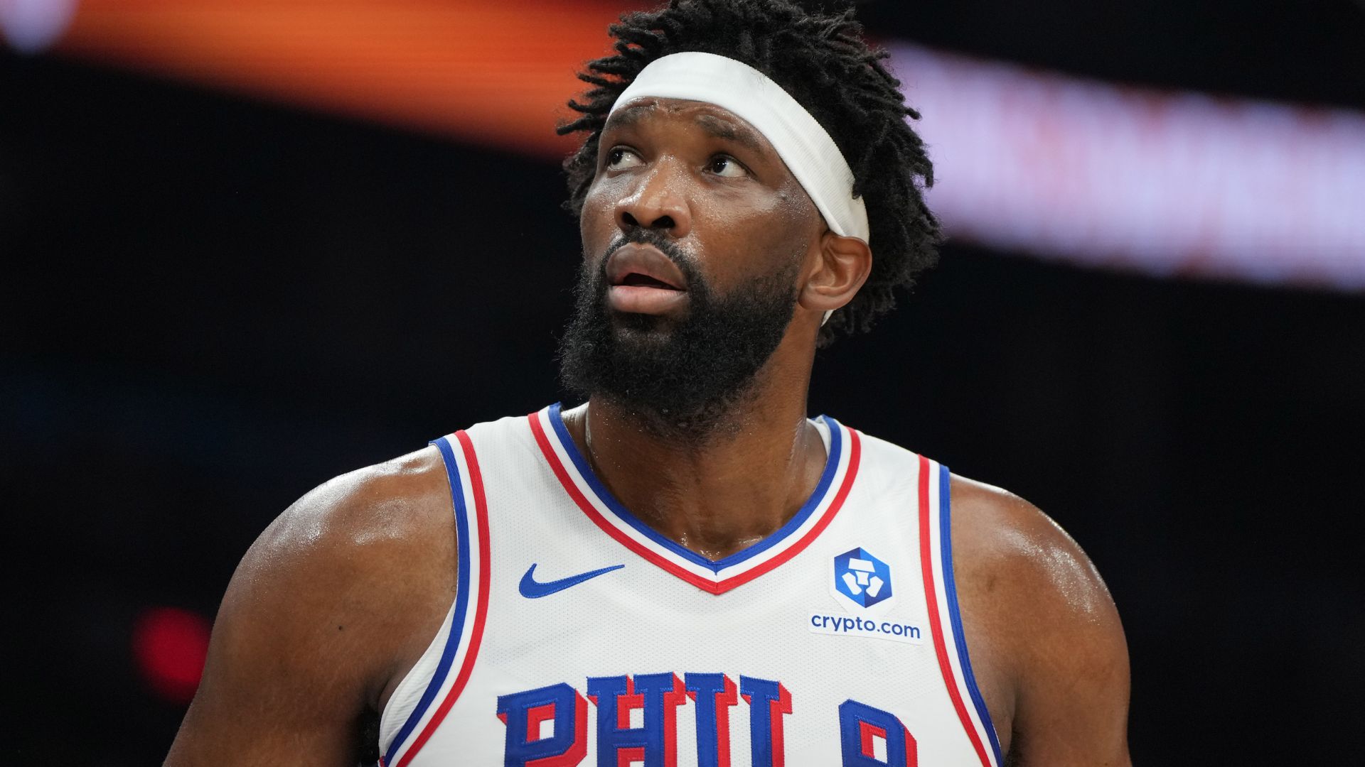 Feb 7, 2026; Phoenix, Arizona, USA; Philadelphia 76ers center Joel Embiid (21) reacts against the Phoenix Suns during the first half of an NBA game at Mortgage Matchup Center
