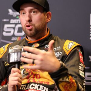 Feb 11, 2026; Daytona Beach, Florida, USA;NASCAR Cup Series driver Chase Briscoe (19) speaks to the media during the Daytona 500 Media Day at Daytona International Speedway.