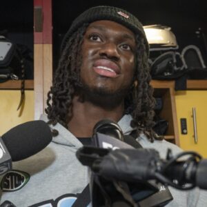 Marvin Harrison Jr. talks with the media in the locker room at Dignity Health Arizona Cardinals Training Center in Tempe on Jan. 5, 2026.
