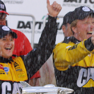 Ward Burton celebrates with his crew chief, Tommy Baldwin in Victory Lane after winning the Daytona 500 at Daytona International Speedway, Sunday, February 17, 2002. Burton won after Sterling Marlin tried to pull a bent piece of sheet metal away from his tire during a red-flag stop in the race. Marlin's gaffe will forever be part of NASCAR's lore, with some saying his illegal attempt to fix his car under the red flag cost him a victory.
