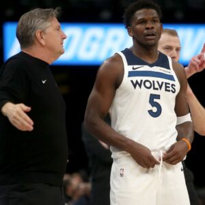 Jan 31, 2026; Memphis, Tennessee, USA; Minnesota Timberwolves guard Anthony Edwards (5) talks with head coach Chris Finch during the fourth quarter against the Memphis Grizzlies at FedExForum