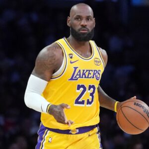 Los Angeles Lakers forward LeBron James (23) dribbles the ball against the LA Clippers in the first half at Crypto.com Arena