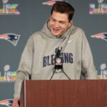 New England Patriots quarterback Drake Maye (10) talks to media members at the Santa Clara Marriott.